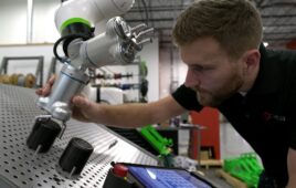 robotics integrator Acieta setting up a FANUC collaborative robot arm