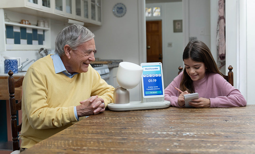 Steve, an ElliQ user, playing a game with ElliQ.